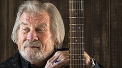 Lawrence musician Arnie Johnson is pictured Thursday, March 2, 2017 in his home.
