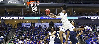 Kansas guard Josh Jackson (11) lunges toward the bucket for a shot during the second half on Friday, March 17, 2017 at BOK Center in Tulsa, Oklahoma.