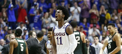 Kansas guard Josh Jackson (11) roars after a Michigan State timeout during a run by the Jayhawks in the second half on Sunday, March 19, 2017 at BOK Center in Tulsa, Okla.