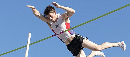 Nick Meyer vaults over the bar in the Kansas Relays' Street Pole Vault event on Thursday. Meyer took first place in the men's event.