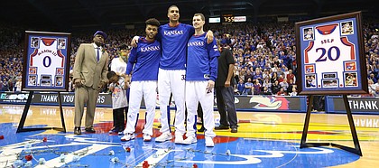 Kansas seniors Frank Mason III, left, Landen Lucas and Tyler Self come together for a photograph during the senior introductions on Monday, Feb. 27, 2017.