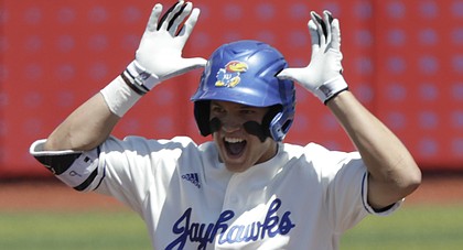 Kansas freshman James Cosentino celebrates a standup double during the Jayhawks' game Saturday, May 13, against the Kansas State Wildcats