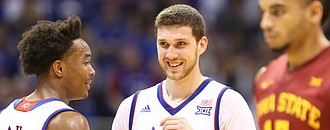 Kansas guard Sviatoslav Mykhailiuk (10) has a laugh with Kansas guard Devonte' Graham (4) during the first half against Iowa State, Saturday, Feb. 4, 2017 at Allen Fieldhouse.