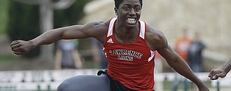 Lawrence High School hurdler James Reeder wins the 110 hurdles during the Free State Invitational on Friday at FSHS.