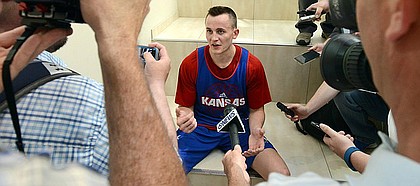 Kansas forward Mitch Lightfoot talks with the media following a camp scrimmage on Wednesday, June 14, 2017 at the Horejsi Family Athletics Center.