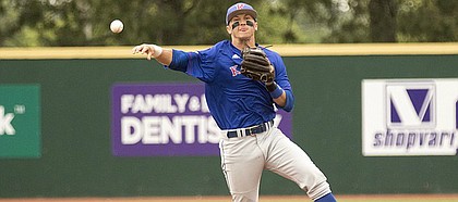 Kansas sophomore shortstop Matt McLaughlin makes a throw to first base for an out during the Jayhawks' game against Kansas State on Sunday afternoon at Tointon Family Stadium in Manhattan. The Jayhawks fell to the Wildcats, 8-5.
