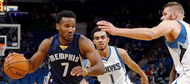 FILE — Wayne Selden Jr., left, drives as Minnesota Timberwolves' Tyus Jones, center, and Cole Aldrich defend during the second half of an NBA preseason basketball game Wednesday, Oct. 19, 2016, in Minneapolis. Selden on March 7, 2017, agreed to a 10-day contract with the New Orleans Pelicans. (AP Photo/Jim Mone)
