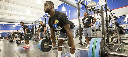 Kansas defensive end Josh Ehambe prepares for a lift during a workout at the Anderson Family Football Complex on Thursday, June 29, 2017.