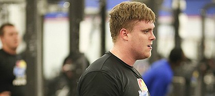 Kansas offensive lineman Jacob Bragg works through a set at the Anderson Family Football Complex on Thursday, June 29, 2017.