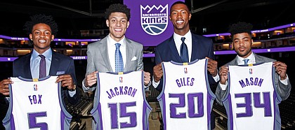 Sacramento rookies, from left to right, De'Aaron Fox, Justin Jackson, Harry Giles and Frank Mason, pose with Kings jerseys representing the spot each player was picked in this year's NBA Draft. On Friday, July 7, 2017, the foursome officially got their NBA careers under way with their summer league debuts in Las Vegas.