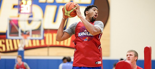 Kansas forward Dedric Lawson (1) pulls down a rebound while running drills with the post players during an open practice on Tuesday, July 11, 2017. The Jayhawks are preparing for four early-August exhibition games in Italy.