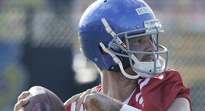 Kansas junior quarterback Peyton Bender looks down the field during the team's second fall camp practice on Tuesday, Aug. 1, 2017.