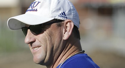 Kansas football head coach David Beaty cracks a smile during the team's second fall camp practice on Tuesday, Aug. 1, 2017.