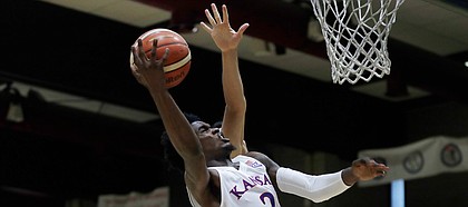 Kansas guard Lagerald Vick drives hard to the rim during a basketball match between Kansas University and an Italian selection of players, in Seregno, near Milan, Italy, Saturday, Aug. 5, 2017.