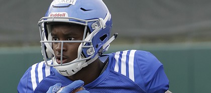 Kansas receiver Jeremiah Booker catches a pass during a drill in preseason practice on Monday, Aug. 7, 2017.