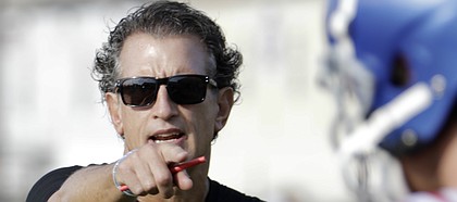 Kansas offensive coordinator Doug Meacham points during a drill in the team's second practice of fall camp on Tuesday, Aug. 1, 2017.