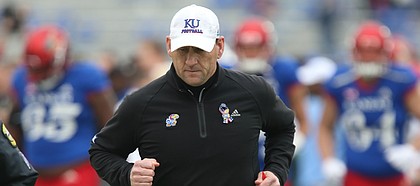 Kansas head coach David Beaty runs off the field following the Jayhawks' 38-9 loss to Baylor on Saturday, Sept. 4, 2017 at Memorial Stadium. Before Saturday's game, Baylor was winless on the season.