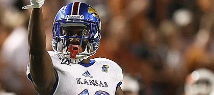 Kansas wide receiver Evan Fairs (19) celebrates a completion during first half of an NCAA football game, Saturday, Nov. 11, 2017 in Austin, Texas. (TFV Media via AP)