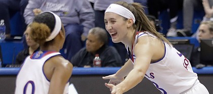 Kansas guard Kylee Kopatich (33) celebrates with a teammate after sinking one of her five first-half 3-point baskets in the Jayhawks' 66-48 win over Campbell on Sunday, Nov. 12 at Allen Fieldhouse.