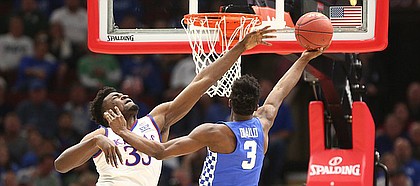 Kansas center Udoka Azubuike (35) defends against a shot from Kentucky guard Hamidou Diallo (3) during the first half on Tuesday, Nov. 14, 2017 at United Center.