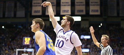Kansas guard Sviatoslav Mykhailiuk (10) watches his shot behind South Dakota State guard Lane Severyn (25) during the first half on Friday, Nov. 17, 2017 at Allen Fieldhouse.