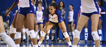 Kansas setter Ainise Havili (11) gets ready for a serve by Texas during the second set on Wednesday, Oct. 11, 2017 at Horejsi Center.