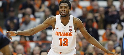 Syracuse's Paschal Chukwu anchors his team's 2-3 zone defense during the second half of an NCAA college basketball game against Monmouth in Syracuse, N.Y., Friday, Nov. 18, 2016.