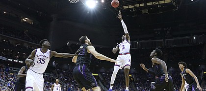 Kansas guard Lagerald Vick (2) puts up a shot in the paint during the first half, Wednesday, Dec. 6, 2017 at Sprint Center.