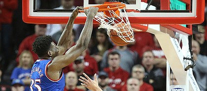 Kansas center Udoka Azubuike (35) delivers a dunk before Nebraska forward Isaiah Roby (15) during the first half, Saturday, Dec. 16, 2017 at Pinnacle Bank Arena in Lincoln, Nebraska.