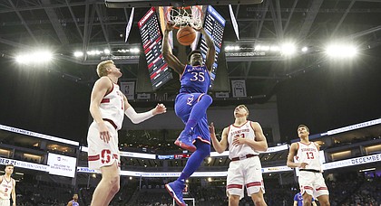 Kansas center Udoka Azubuike (35) delivers a dunk before the Stanford defense during the first half, Thursday, Dec. 21, 2017 at Golden 1 Center in Sacramento, California.