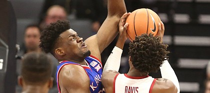 Kansas center Udoka Azubuike (35) gets up to defend against Stanford guard Daejon Davis (1) during the first half, Thursday, Dec. 21, 2017 at Golden 1 Center in Sacramento, California.