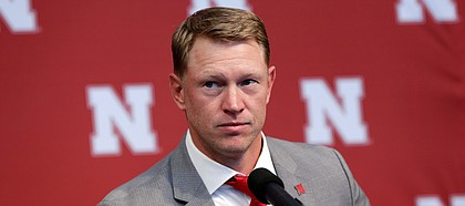 New Nebraska head NCAA college football coach Scott Frost takes a question during a news conference in Lincoln, Neb., Sunday, Dec. 3, 2017. Frost is returning to Nebraska after orchestrating a stunning two-year turnaround at Central Florida. The native son quarterbacked the Cornhuskers to a share of the national championship 20 years ago and coached UCF to a 13-0 record this season, two years after inheriting a program coming off an 0-12 record. (AP Photo/Nati Harnik)
