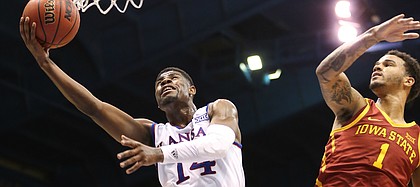 Kansas guard Malik Newman (14) gets in for a bucket against Iowa State guard Nick Weiler-Babb (1) during the second half, Tuesday, Jan. 9, 2018 at Allen Fieldhouse.