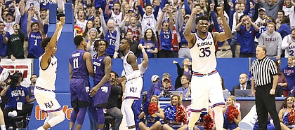 Kansas center Udoka Azubuike (35) and the Jayhawks celebrate after a last second shot by Kansas State guard Barry Brown missed, securing the game for the Jayhawks, Saturday, Jan. 13, 2018 at Allen Fieldhouse.