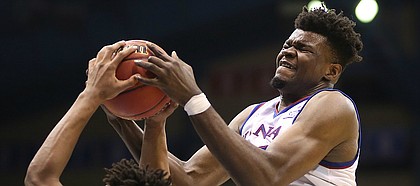 Kansas center Udoka Azubuike (35) fights for a rebound with Baylor forward Mark Vital (11) during the second half, Saturday, Jan. 20, 2018 at Allen Fieldhouse.