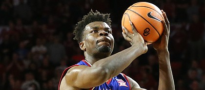 Kansas center Udoka Azubuike (35) shoots a free throw during the second half at Lloyd Noble Center on Tuesday, Jan. 23, 2018 in Norman, Oklahoma.