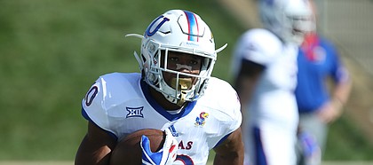 Kansas running back Khalil Herbert (10) fields a kickoff during warmups on Saturday, Sept. 16, 2017 at Peden Stadium in Athens, Ohio.