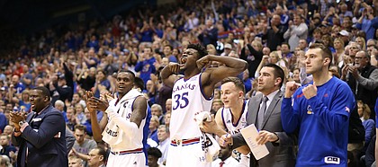 Kansas center Udoka Azubuike (35) and the bench celebrate a bucket from Kansas forward Silvio De Sousa (22) during the second half, Monday, Feb. 19, 2018 at Allen Fieldhouse.