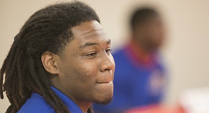 Kansas defensive tackle Charles "Codey" Cole takes questions from media members following head coach David Beaty's National Signing Day press conference on Wednesday, Feb. 7, 2018 at the Anderson Family Football Complex.