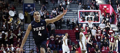 Pennsylvania's Darnell Foreman reacts to his three-point shot to end the first half of an NCAA college basketball championship game in the Ivy League Tournament against the Harvard, Sunday, March 11, 2018, in Philadelphia. (AP Photo/Chris Szagola)