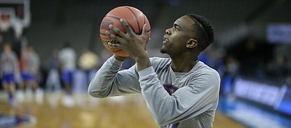 Kansas guard Lagerald Vick (2) lines up a shot during practice on Thursday, March 22, 2018 at CenturyLink Center in Omaha, Neb.