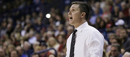 San Francisco’s Head Coach Rex Walters instructs his team during the first half of an NCAA basketball game against Gonzaga on Monday, Dec., 30, 2013 in Spokane, Wash.