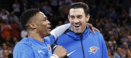 Oklahoma City Thunder guard Russell Westbrook, left, addresses the crowd with teammate Nick Collison, right, before an NBA basketball game against the Memphis Grizzlies in Oklahoma City, Wednesday, April 11, 2018. (AP Photo/Sue Ogrocki)