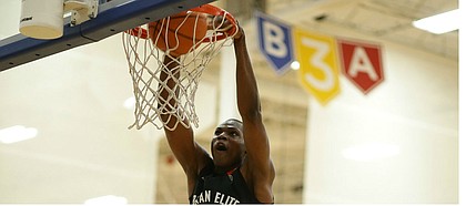N'Faly Dante, No. 4-ranked prospect by Rivals in Class of 2020, dunks during showcase game Saturday night at KC Classic at Sports Pavilion Lawrence. (Photo by Darryl Woods/810 Varsity).