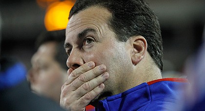 Kansas University athletic director Sheahon Zenger watches a video replay of a Kansas State touchdown that gave the Wildcats a 45-13 lead in the second-half of the Jayhawks 51-13 loss to KSU Saturday in Manhattan.