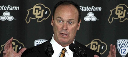 Rick George speaks during a news conference at which he was named Colorado athletic director, in Boulder, Colo., Wednesday, July 17, 2013. George has been the president of business operations for the Texas Rangers. George once served as Colorado's assistant athletic director for football operations from 1987-91. (AP Photo/Brennan Linsley)