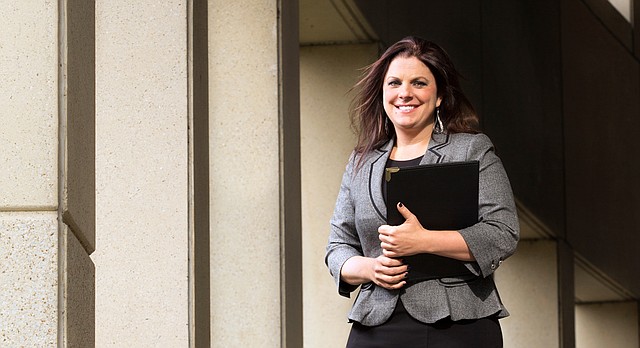 In this file photo from Dec. 12, 2014, Lawrence defense attorney Sarah Swain is pictured outside the Lawrence Douglas County Law Enforcement Center.	