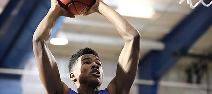 Blue Team guard Ochai Agbaji comes in for a dunk before a scrimmage on Tuesday, June 5, 2018, at the Horejsi Athletic Center.