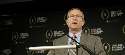 Former Arkansas athletic director Jeff Long, who once served as the chairman of College Football Playoff selection committee, responds to questions during a news conference on Wednesday, Oct. 16, 2013, in Irving, Texas.