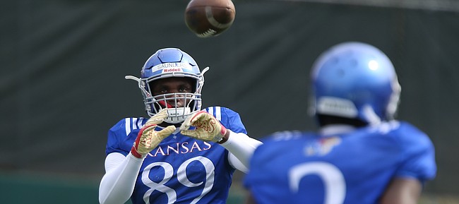 Kansas tight end Mavin Saunders catches a pass during practice on Tuesday, April 17, 2018.